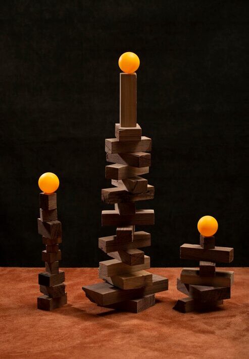 figures made wooden cubes with orange balls top 140241 2745